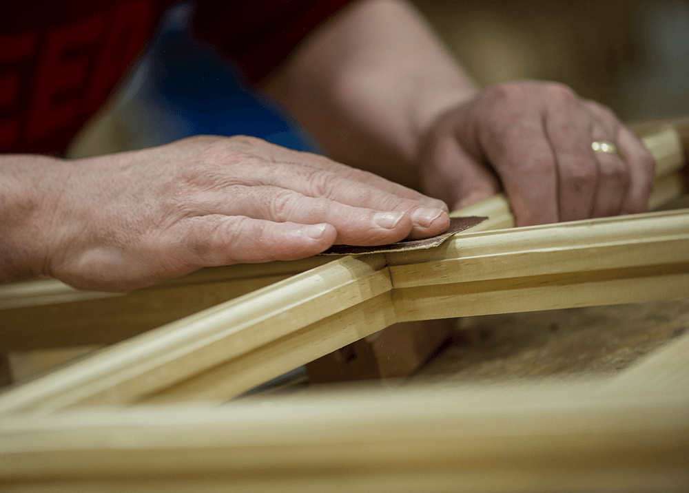 sanding timber window frame